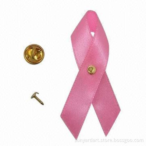 Cancer awareness ribbon bow with butterfly safety pin